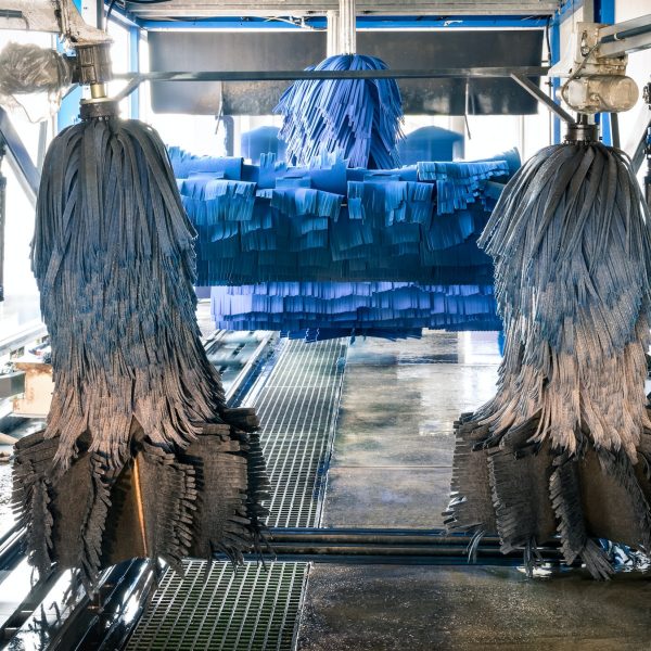 Modern automatic carwash with blue brushes